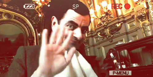 Mr. Bean acenando